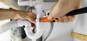 plumber fix sink pipe
